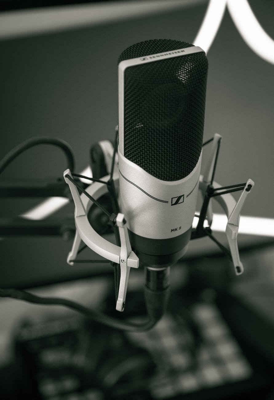 selective focus photography of condenser microphone